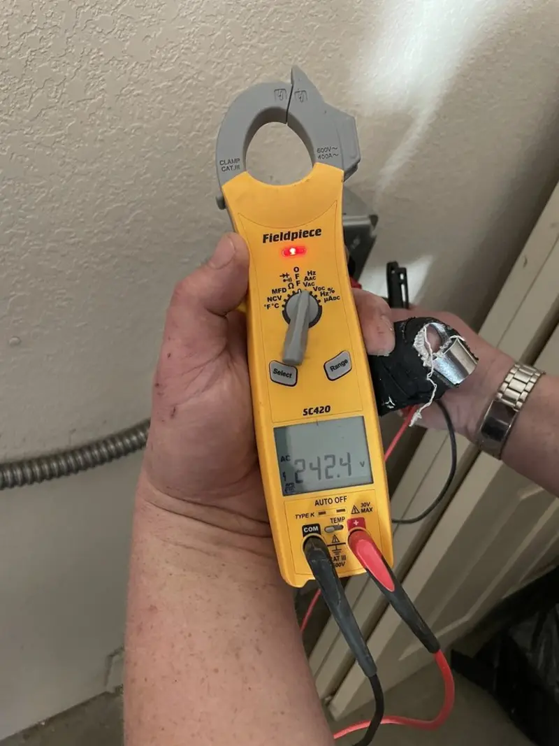 Voltage testing with clamp meter during Generator Installation in Dunbar
